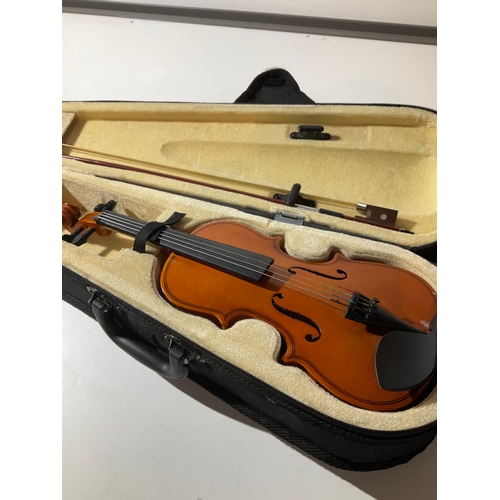 175 - Small violin with bow in case