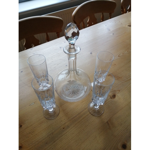 43A - Glass decanter and 4 champagne glasses