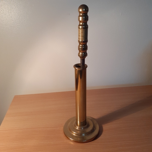 4 - Brass poker in holder. Approx 27cm