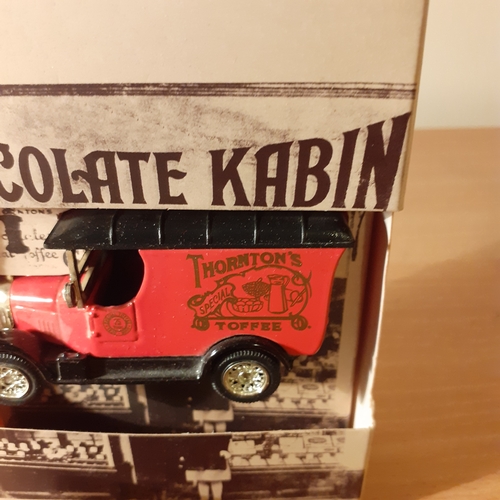 14 - Diecast x 2. Boxed as new Thorntons toffee chocolate kabin and carnation milk truck