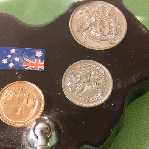 17 - Australian coin set in casing. Looks like pen or something missing from stand