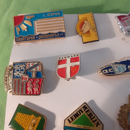 20 - Collection of pin badges from around the world.  Russia, France, Canada etc.