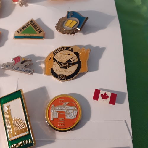 20 - Collection of pin badges from around the world.  Russia, France, Canada etc.