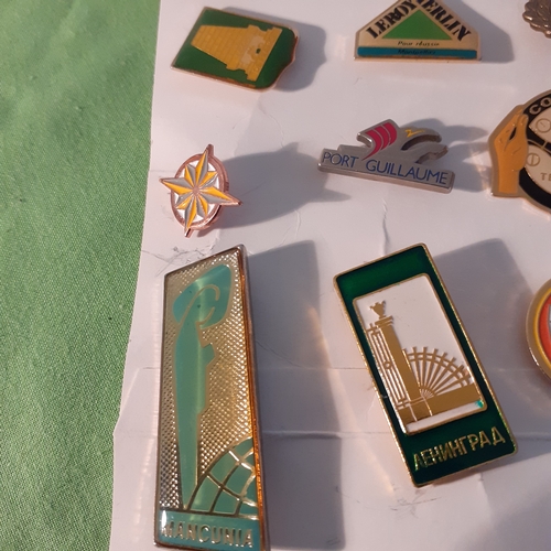 20 - Collection of pin badges from around the world.  Russia, France, Canada etc.