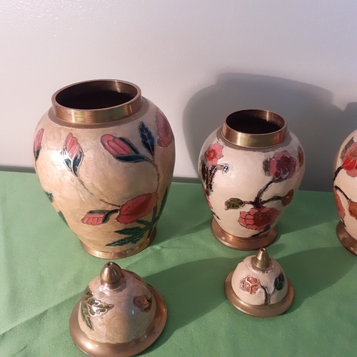 24 - 2 enamelled brass lidded urns and matching vase