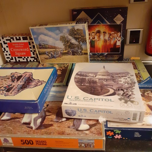 37 - Quantity of jigsaw puzzles. Most boxes with bagged pieces, mostly complete