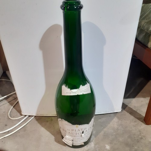 38 - Large 2ft high champagne bottle, empty. Good money bottle or collectors item.