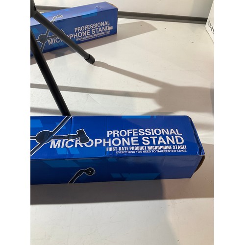 106 - 2 boxed professional microphone stands