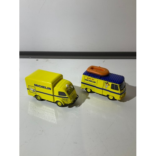 58 - 2 Mitchelin toy trucks