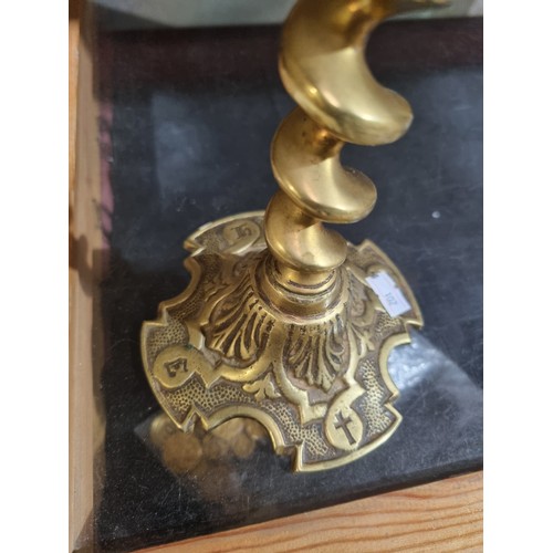 45 - Pair of spiral brass candlestick holders