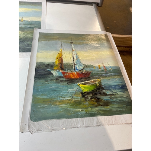 242A - Oil canvas paintings - 69x 58cm - depicting boats at sea - 2 similar style paintings