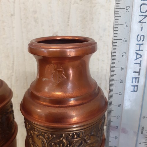 4 - Pair of copper vases with detailed brass inlay.