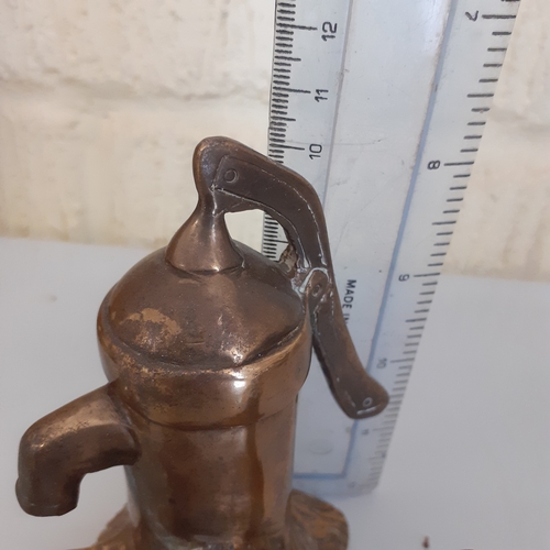 5 - Brass wren drinking from water pump. Heavy for size, solid brass. Size shown in picture