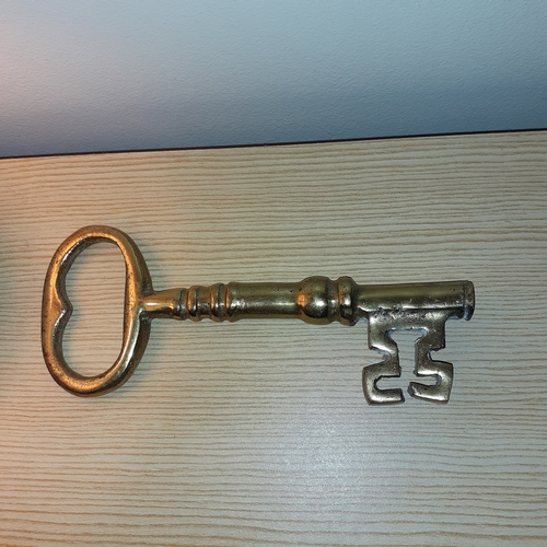 13 - Solid brass key. Size shown in picture