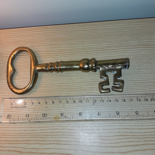 13 - Solid brass key. Size shown in picture