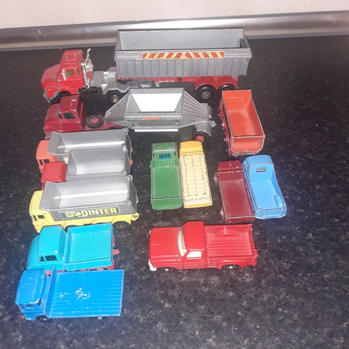 22 - Quantity of diecast open back trucks. Most matchbox