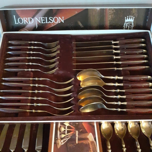 82 - Large quantity of Fürst Lord Nelson Brass/Rosewood cutlery. Mostly boxed good condition around 50 pi... 