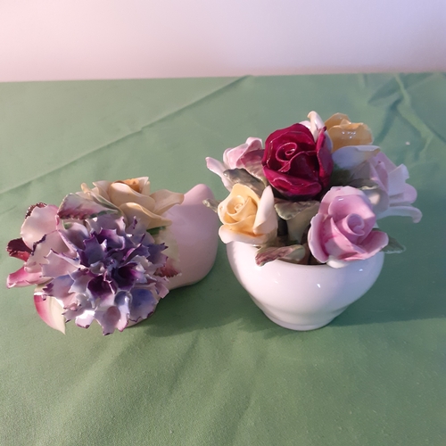 114 - 2 ceramic flower posies. One Radnor and one coalport.