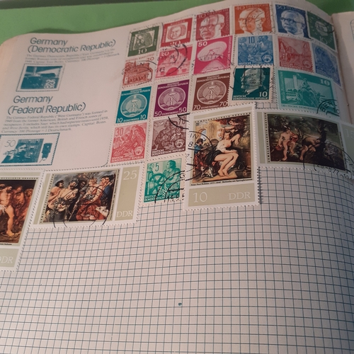 3 - Amateur stamp collection in book by country. Some pages are blank.