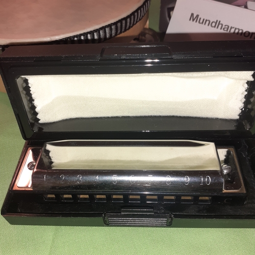 2 - Harmonica and small  tambourine. Like new condition.