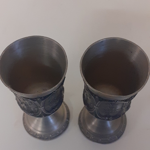 123 - Pair of pewter small footed goblets. Honours self taught painter Carl Spitzweg Germany