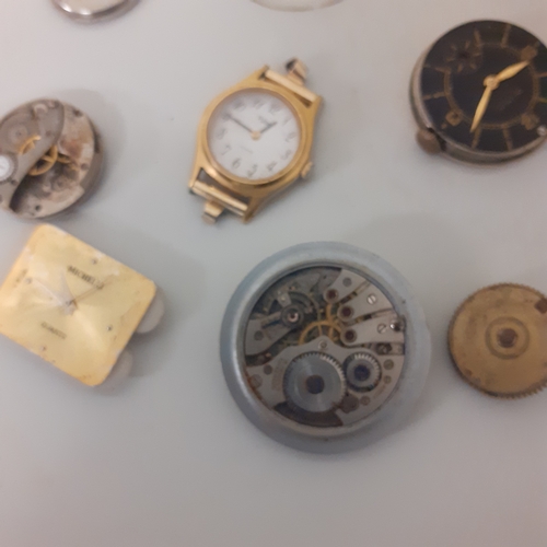 112 - Quantity of watch movements, faces and cases. Sold for spares and repairs