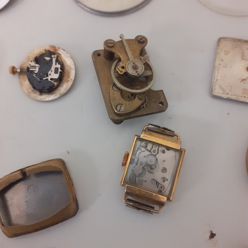 112 - Quantity of watch movements, faces and cases. Sold for spares and repairs