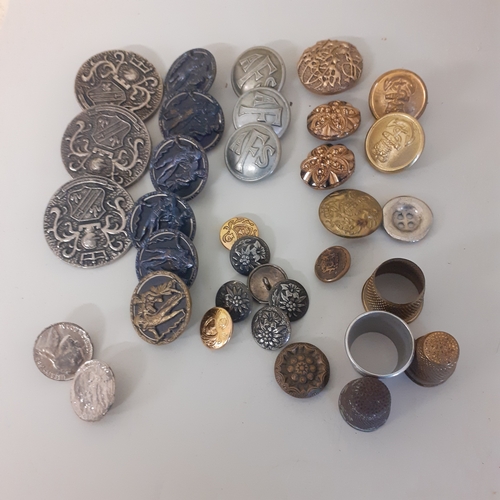 85 - Quantity of various metal buttons and thimbles. Including AFS