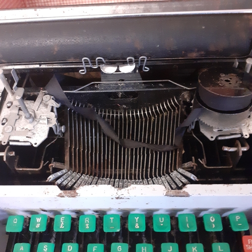 21 - Childs size vintage typewriter. No makers mark, possibly Lilliput. Circa 1950s. Needs cleaning upand... 