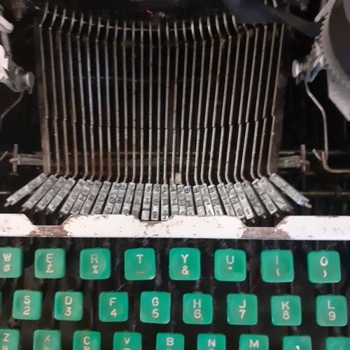 21 - Childs size vintage typewriter. No makers mark, possibly Lilliput. Circa 1950s. Needs cleaning upand... 