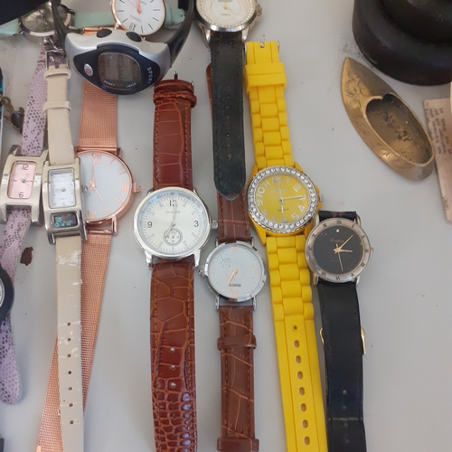 23 - Large quantity of watches. Most working but need batteries. A few spares or repairs including a Lotu... 