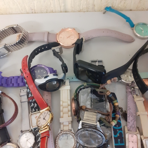 23 - Large quantity of watches. Most working but need batteries. A few spares or repairs including a Lotu... 