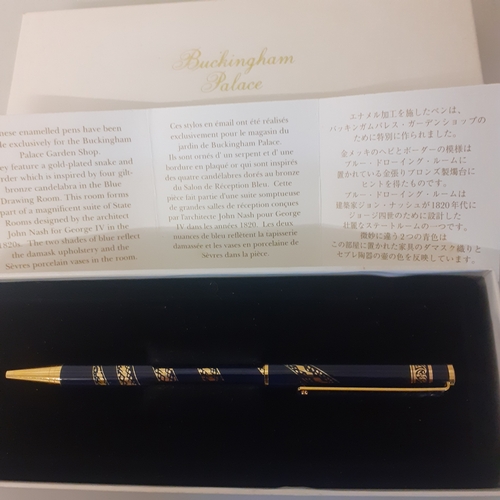 24 - Buckingham Palace souviner pen. Gold plated snake design. With certificate and box.