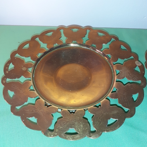 26 - Pair matching brass footed dishes.