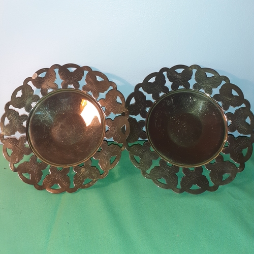 26 - Pair matching brass footed dishes.