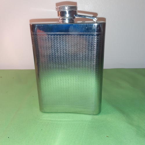 32 - Stainless steel decorative hip flask. Good clean condition.