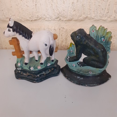 1 - 2 x small cast iron doorstops. Frog and horse.