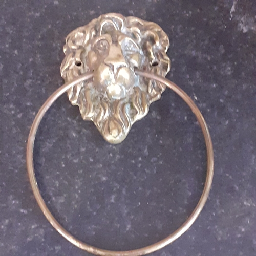 143 - Vintage, possibly antique brass lions head door pull. Nice detail. Large pull ring