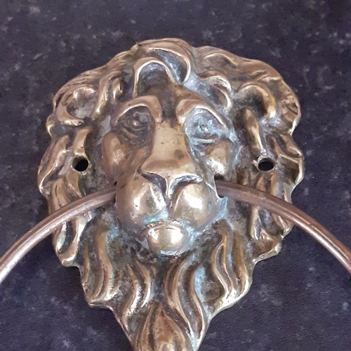 143 - Vintage, possibly antique brass lions head door pull. Nice detail. Large pull ring