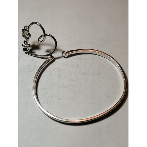 29A - Silver bangle with heart shaped floral design 11.16 grams