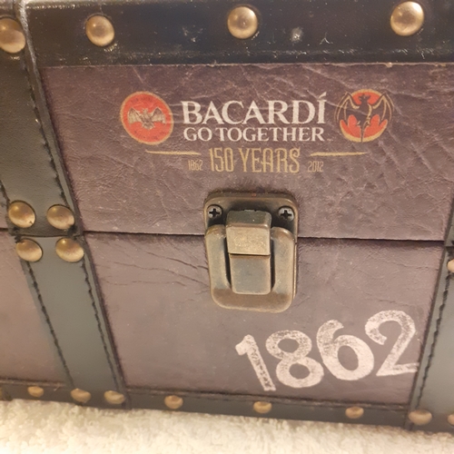 132 - Modern leather effect box advertising 150 years of Bacardi. Nice condition