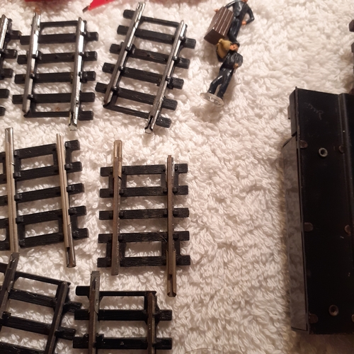 151 - Quantity of small Horby track, a battery controller, triang platform and spare platform piece. Dubli... 