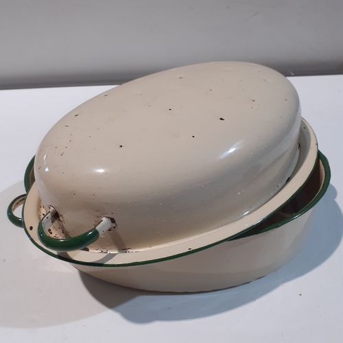 12 - Green trim enamel roasting pot with lid. Large 14 inches length