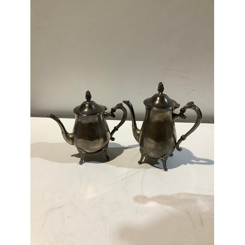 23 - Pair of silver plated coffee pots