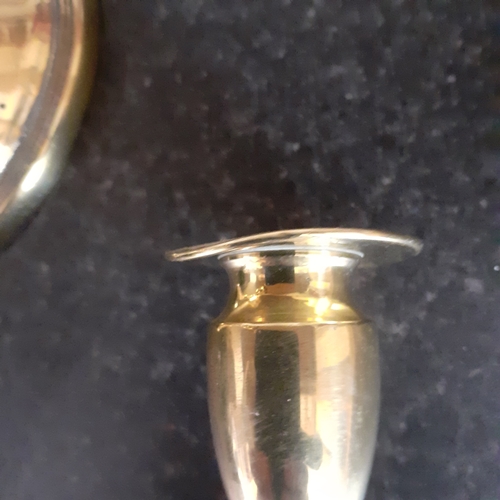 76 - Pair oval shape base brass candlesticks. Just short of 11cm.