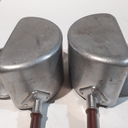 108 - 2 stainless Steel Swan half pans, very good condition. Look like bakelite handles and knobs.