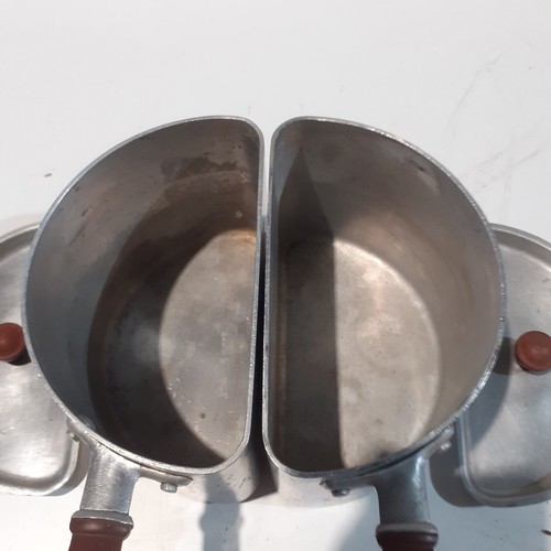 108 - 2 stainless Steel Swan half pans, very good condition. Look like bakelite handles and knobs.