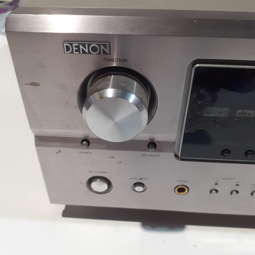 120 - Denon AV AVR-2105 amp. Sold as spares. Switches off after a few seconds