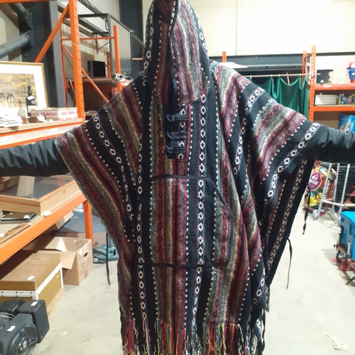 20 - Coloured woven Indian style shawl/cloak. Tasselled edges. Nice condition.