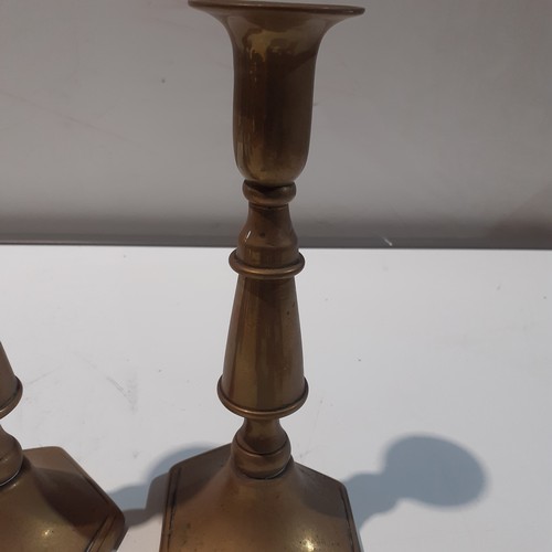 129 - Pair brass candlesticks. Approx 9” high